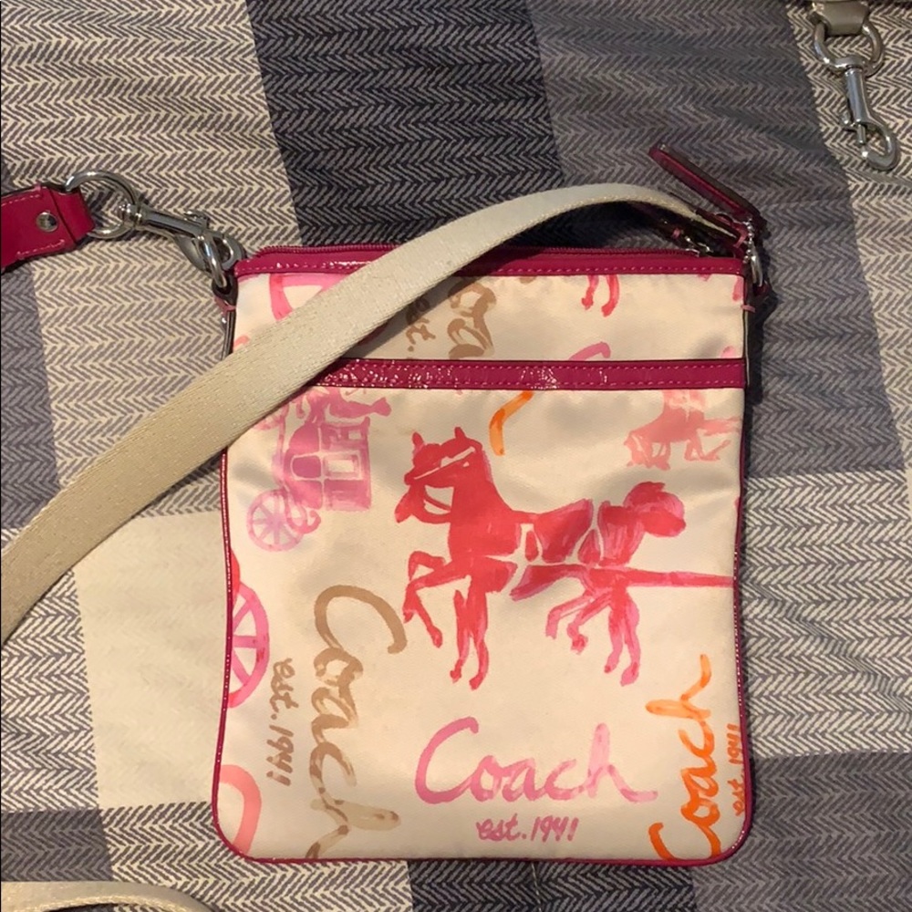 adjustable 2 pocket crossbody purse from Coach!
